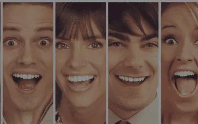 four people smiling